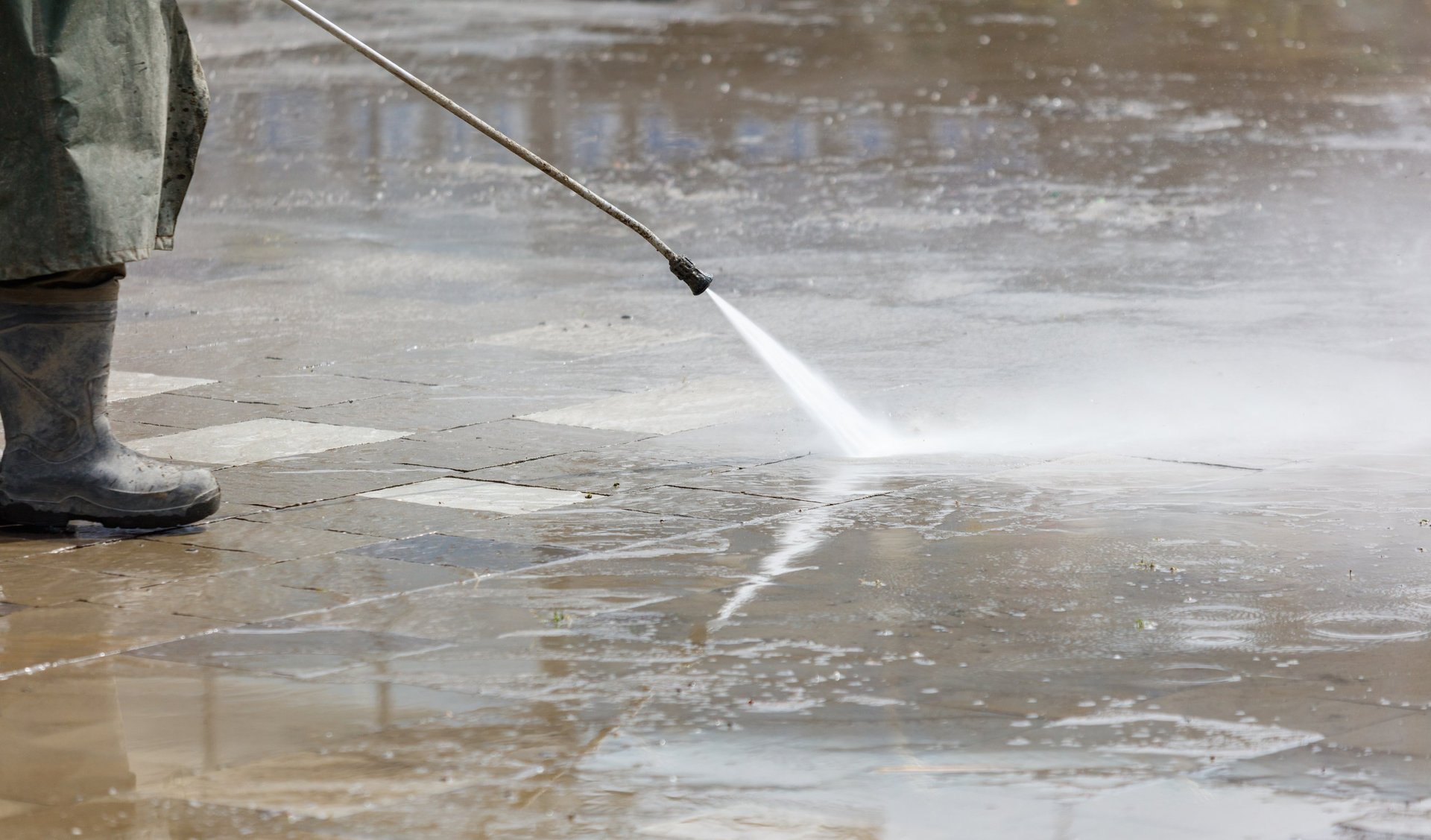 Power washing a driveway